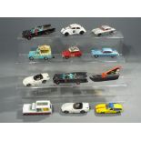 Corgi, Dinky, Politoys - 12 unboxed diecast and plastic model vehicles.