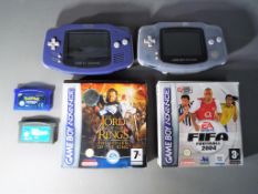 Nintendo - Two Nintendo Game Boy Advance hand held game consoles with four games comprising FIFA