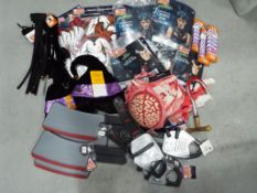Unused Retail Stock - a large quantity of Halloween costume accessories,