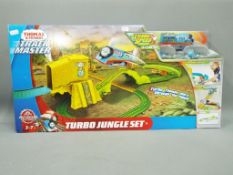 Thomas The Tank Engine - A boxed Thomas the Tank Engine & Friends Turbo Jungle Set.