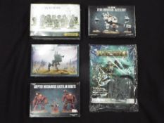 Warhammer - Four boxed Warhammer Sets and a sealed Warhammer Age of Sigmar sealed Magazine Game.
