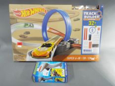 Hot Wheels Track Builder System 32+ assembling kit by Matel and Scalextric Digital Controller,