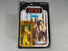 Star Wars - A Kenner Return of the Jedi Logray (Ewok Medicine Man) action figure # 70710 contained