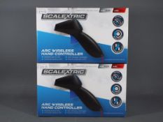 Scalextric - Two boxed Scalextric C8438 ARC Wirelaess Hand Controllers. Items are retail stock.