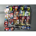Star Wars, Kenner, Hasbro, Disney - 17 Star Wars related carded action figures and toys.