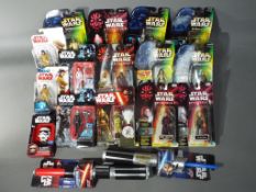 Star Wars, Kenner, Hasbro, Disney - 17 Star Wars related carded action figures and toys.
