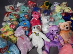 TY Beanie Babies - 25 TY Beanie Babies with TY ear tags.