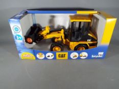 Retail Stock - a boxed Cat Wheel Loader by Bruder 1:16 scale in excellent condition