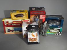 Corgi, Vanguards, Hasbro and Others - A mixed lot of retail stock that includes diecast,