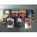 Warhammer, Marvel - A collection of eleven Graphic Novels and Warhammer Codex guides. Items.