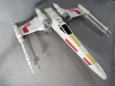 Star Wars - A large unboxed Star Wars X Wing Fighter.