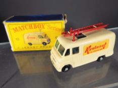 Matchbox - Rentaset TV service van with aerial and ladder to the roof, three TV sets inside van,