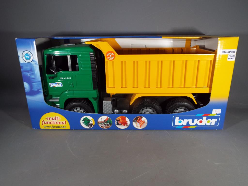 Retail Stock - a Bruder Man TGA Tipper Truck 1:16 scale in mint condition.