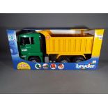 Retail Stock - a Bruder Man TGA Tipper Truck 1:16 scale in mint condition.