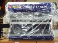 Revell - A Revell Hobby Centre display stand.