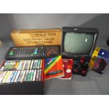 Amstrad - A boxed Amstrad CPC 464 personal computer, with instructions, monitor, joystick and games.