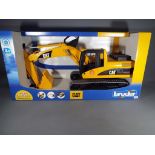Retail Stock - a boxed CAT Excavator 1:16 scale in mint condition.