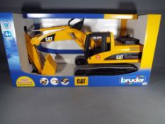 Retail Stock - a boxed CAT Excavator 1:16 scale in mint condition.