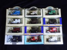 Lledo - 12 boxed diecast model vehicles by Lledo.