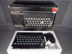 Sinclair - A boxed Sinclair ZX Spectrum Personal Computer in original box.