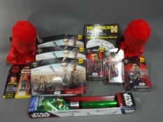 Star Wars, Hasbro, Disney and Others - A quantity of boxed Star Wars related Action Figure,