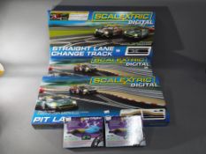 Scalextric - Five boxed Scalextric Digital Track accessories.
