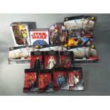 Star Wars, Hasbro, Disney - 15 boxed / carded action figures in various scales and toys.