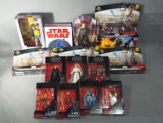 Star Wars, Hasbro, Disney - 15 boxed / carded action figures in various scales and toys.