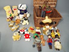 Dolls and Bears - a quantity of soft and resin teddy bears and a wicker basket containing vintage