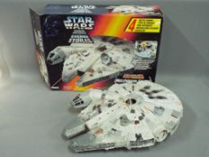 Kenner, Star Wars - A boxed Kenner Electronic Millennium Falcon.