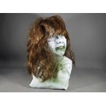 Creature Features - A resin bust of the character 'Regan' from the film 'The Exorcist''.