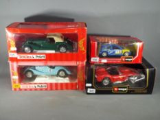 Bburago, Polistil - Four boxed Bburago and Polistil 1:18 and 1:24 scale diecast model cars.