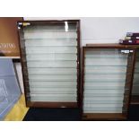 Two good quality display cases with shelves, the larger approximately 83 cm x 55 cm x 9 cm,