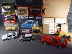 A mixed lot of model motor vehicles to include a Polistil B.R.M P.