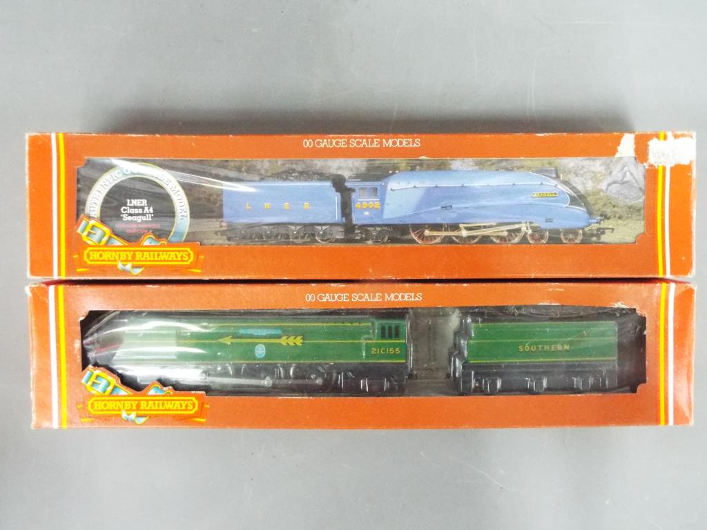 A lot to include Hornby OO gauge # R866 SR 4-6-2 loco 'Fighter Pilot' contained in original box and