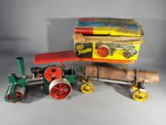 Wilesco - A Wilesco D36 live steam 'Old Smokey' steam roller traction engine in green and red with