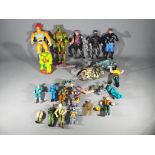 LJN Toys; Kenner, Parker and Others - A collection of vintage unboxed action figures and vehicles.