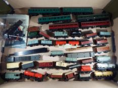 Model Railways - a quantity of TT gauge rolling stock and carriages,