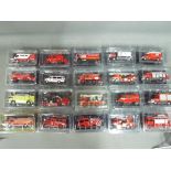 Twenty diecast model fire appliances by del Prado, models appear mint in original packaging.