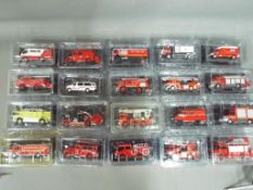 Twenty diecast model fire appliances by del Prado, models appear mint in original packaging.