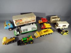 Tonka - A collection of vehicles by Tonka in playworn condition.