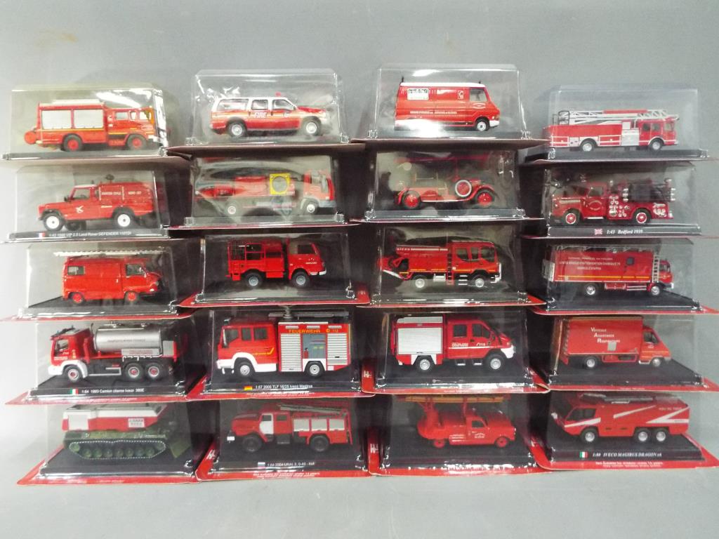 Twenty diecast model fire appliances by del Prado, models are contained in original packaging.