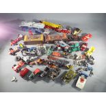 Corgi, Matchbox, Dinky - In excess of 25 unboxed diecast model vehicles in various scales.
