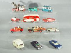 Corgi, Spot-On - 12 unboxed diecast model vehicles in various scales.