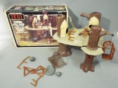 Kenner, Star Wars - A boxed vintage Kenner Star Wars Return of the Jedi Ewok Village Action Playset.