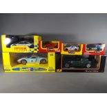 Six boxed diecast models motor vehicles to include a 1:18 scale Ford GT-40 by Revell,