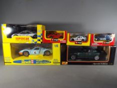 Six boxed diecast models motor vehicles to include a 1:18 scale Ford GT-40 by Revell,