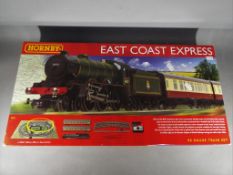Hornby - an OO gauge boxed set, East Coast Express, 4-6-0 locomotive op no 61672, carriages, track,