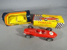 Corgi Clifford - a Corgi diecast vehicle V12 Jaguar E Type model #374 and a Ferrari friction