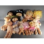 Cabbage Patch Kids - A collection of Cabbage Patch Kids dolls.